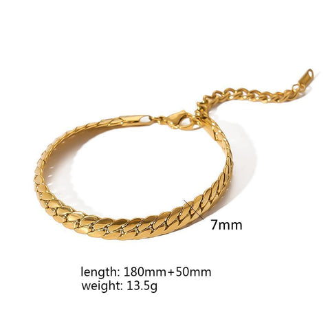 Pulseras de cadena de acero y titanio dorado con hueso de serpiente 