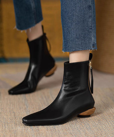 Edle schwarze Stiefel mit Reißverschluss und spitzer Zehenpartie 