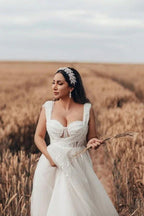 Bezauberndes langes ärmelloses A-Linien-Brautkleid aus Tüll mit Spitze