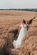 Bezauberndes langes ärmelloses A-Linien-Brautkleid aus Tüll mit Spitze