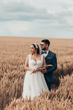Bezauberndes langes ärmelloses A-Linien-Brautkleid aus Tüll mit Spitze