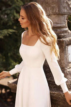 Elegantes vestidos de novia de satén blanco con mangas largas y corte A 