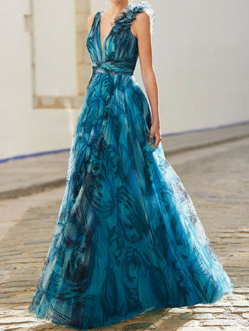 Vestido largo con estampado floral estéreo en azul pavo real 