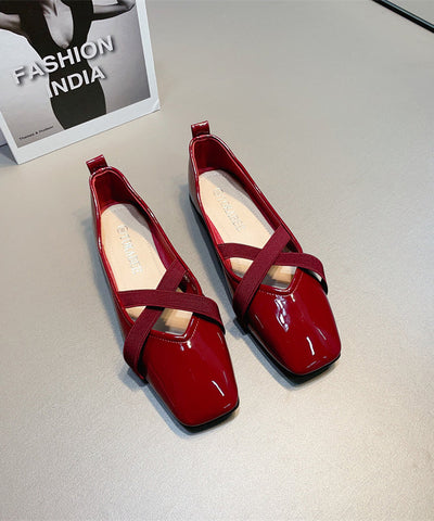 Zapatos planos de piel sintética color vino tinto para mujer con tiras cruzadas 