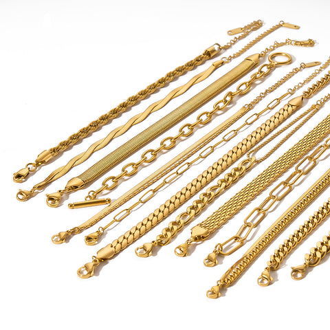 Pulseras de cadena de acero y titanio dorado con hueso de serpiente 