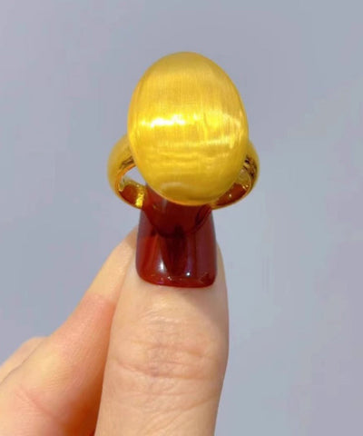 Anillos modernos en forma de huevo de paloma de oro amarillo de 14 quilates 