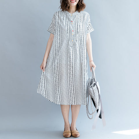 Vestido holgado informal de gasa con estampado floral blanco, holgado y de gran tamaño, con bolsillos y manga corta. 