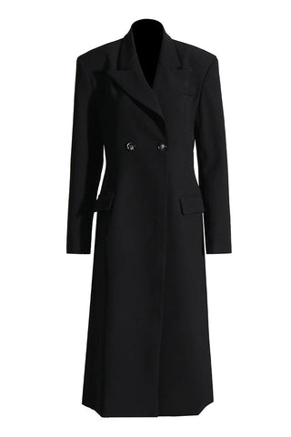 Blazer largo minimalista con solapa y hombreras, cintura ceñida y doble botonadura 