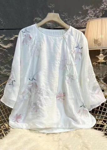 Camisa de lino verde chic con bordado lateral abierto y mangas tipo brazalete 