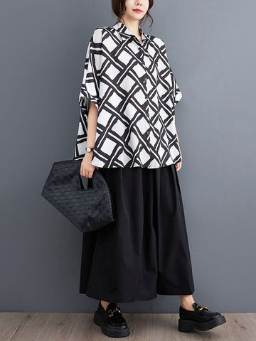 Blusas y camisas con solapas estampadas a cuadros con botones altos y bajos y mangas murciélago 