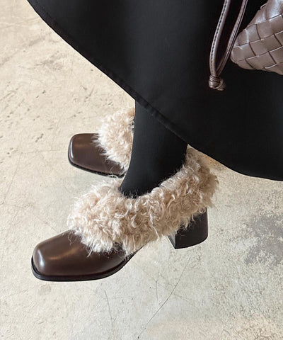 Braune, klobige Loafer-Schuhe aus weichem Kunstleder mit flauschigem Wollfutter 