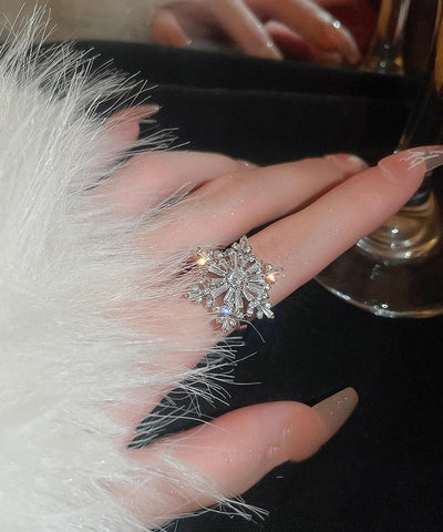 Anillos giratorios de copo de nieve de circón de cobre y seda con diseño original 