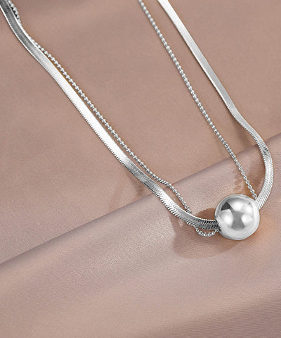 Collar con colgante de bola de acero inoxidable dorado para mujer 