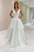 Vestido de novia de diseñador corte A de encaje con cuello en V sin mangas y apliques