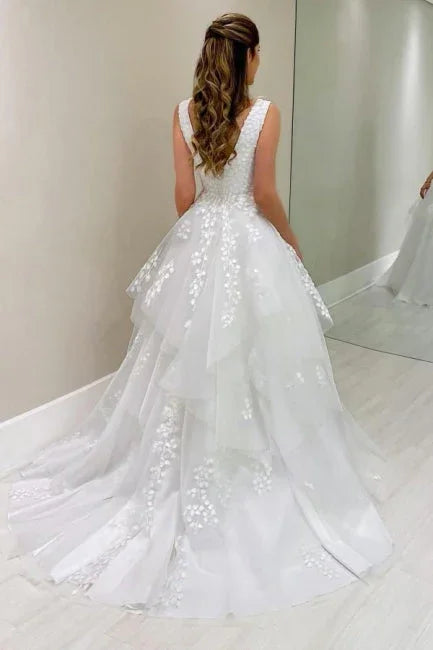 Vestido de novia de diseñador corte A de encaje con cuello en V sin mangas y apliques
