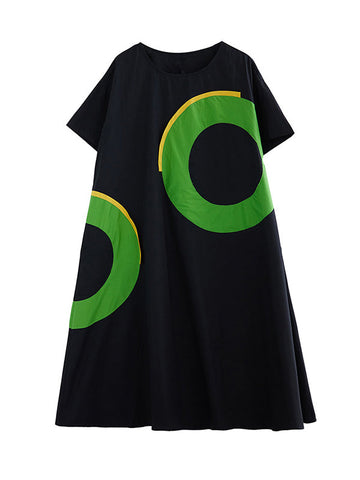 Vestidos midi holgados de manga corta con bolsillos de color en contraste y cuello redondo estampados 