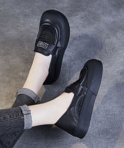 Mocasines casuales de piel de vaca negra con agujeros para mujer 