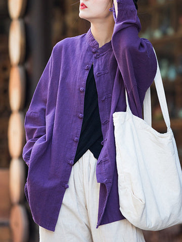 Blusas plisadas de color liso con cuello alto, mangas murciélago y botones de rana chinos sueltos. 