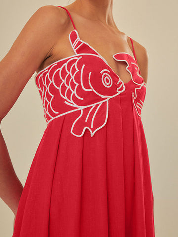 Vestido midi con tirantes finos y bordado de pez 