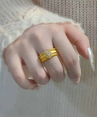 Anillos de huevo de paloma con circonitas doradas en plata fina de ley blanca 