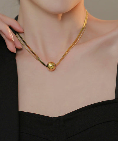 Collar con colgante de bola de acero inoxidable dorado para mujer 