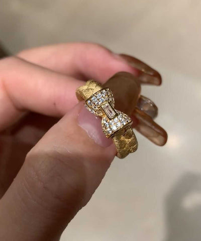 Schicke vergoldete Ringe aus Sterlingsilber mit eingelegtem Zirkonia und Schleife 