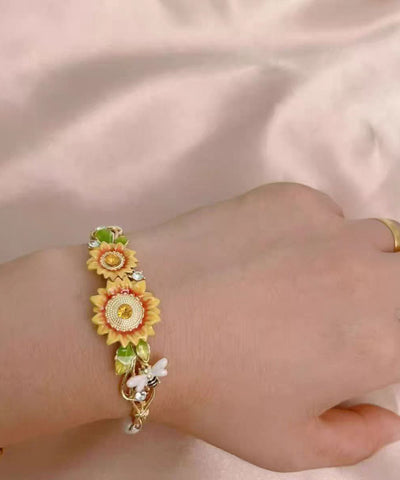 Conjunto de tres piezas de collar, pulsera y pendientes colgantes con borlas de perlas, girasol y circonita dorada vintage 