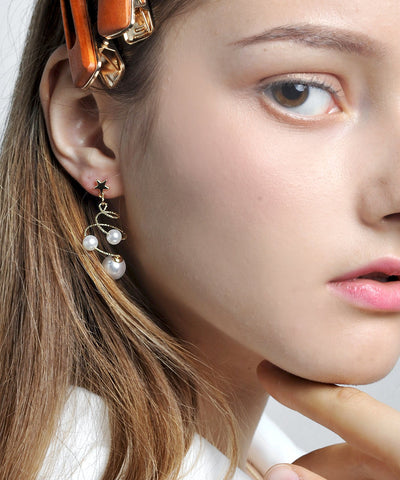 Pendientes colgantes con forma de estrella y perla de cobre blanco Vogue 