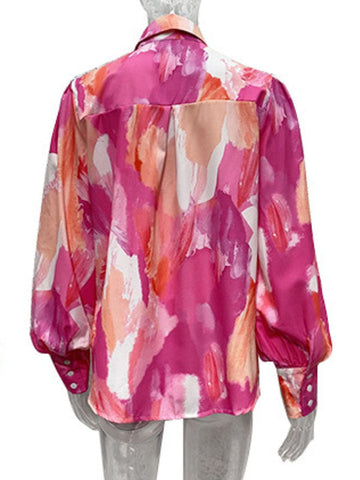 Blusas y camisas de manga larga sueltas con botones y solapa con estampado de colores en contraste. 