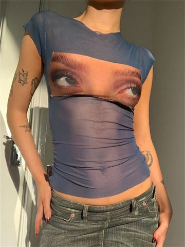TARUXY Camisetas estampadas con ojos divertidos, tops cortos de malla estética de los años 2000, ropa grunge, camisetas gráficas vintage Harajuku, ropa urbana Y2K 