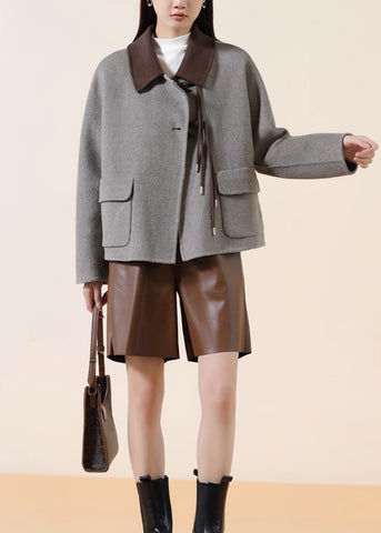 Abrigos de lana con botones chinos y patchwork con borlas grises de moda para invierno 
