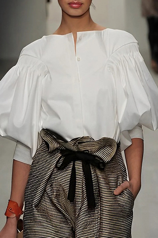 Blusas casuales de cuello redondo con botones de color sólido 