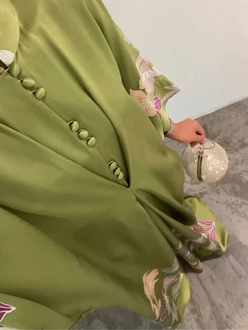 Vestidos largos musulmanes plisados ​​con cuello alto y estampado floral holgado con mangas de murciélago 