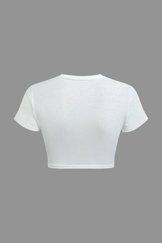 Camiseta corta de cuello redondo con estampado corporal en blanco y negro de Bossy 