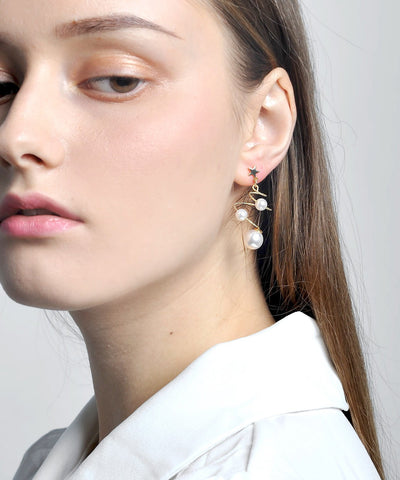 Pendientes colgantes con forma de estrella y perla de cobre blanco Vogue 