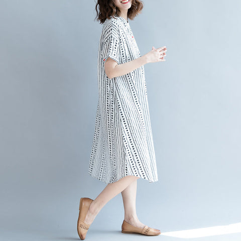 Vestido holgado informal de gasa con estampado floral blanco, holgado y de gran tamaño, con bolsillos y manga corta. 