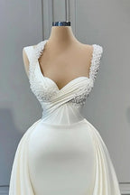 Elegante, ärmellose Brautkleider in A-Linie mit Herzausschnitt und Perlenstickerei