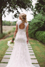 Elegante Vestido de Novia con Apliques de Encaje y Cierre de Cremallera