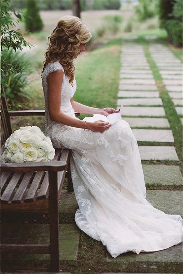 Elegante Vestido de Novia con Apliques de Encaje y Cierre de Cremallera