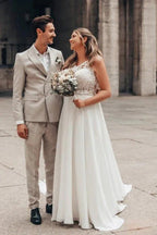 Elegantes langes weißes A-Linien-Hochzeitskleid aus Chiffon, ärmellos und rückenfrei