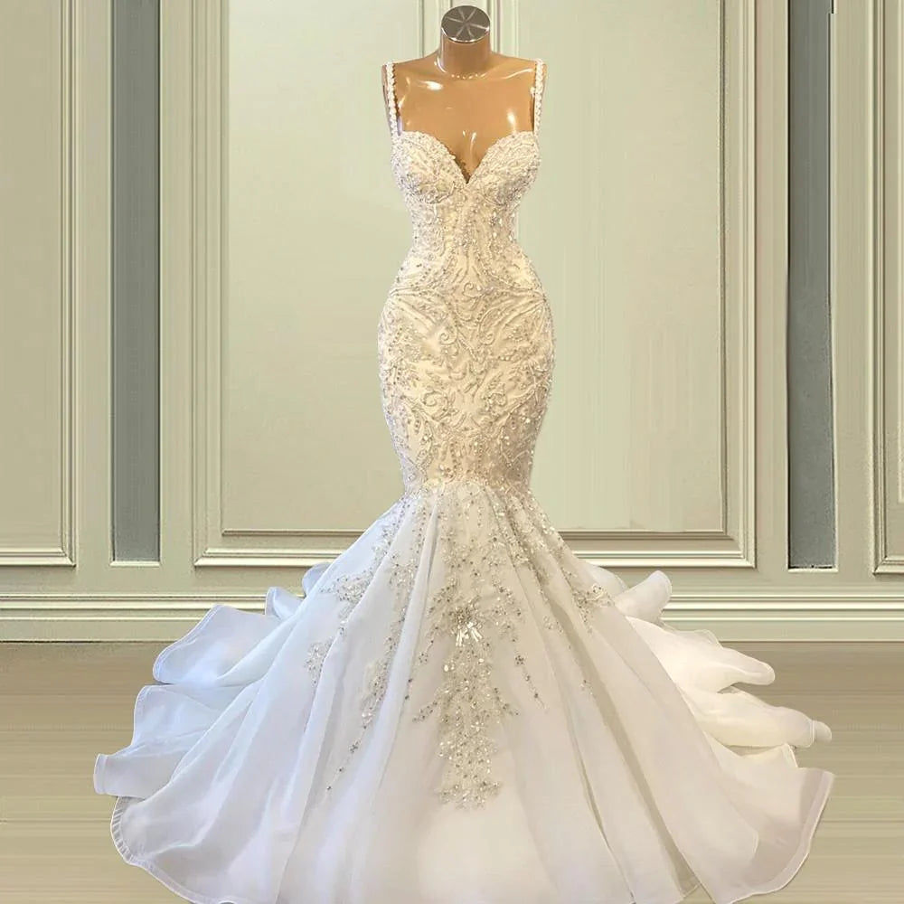 Elegantes ärmelloses Meerjungfrauen-Hochzeitskleid aus Spitze mit Herzausschnitt