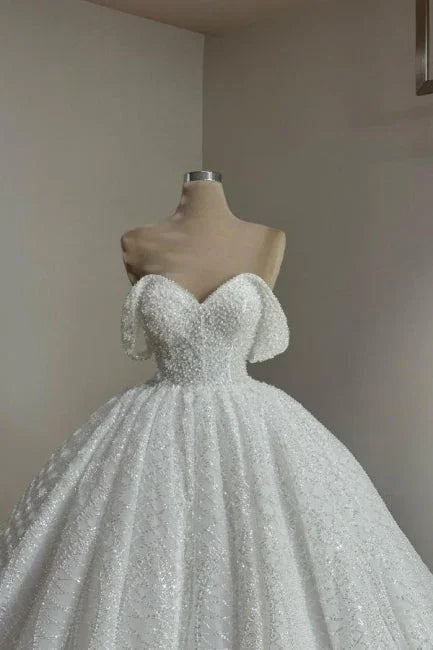 Extravagant Long A-line Off-the-shoulder Lace Wedding Dress with Pearls