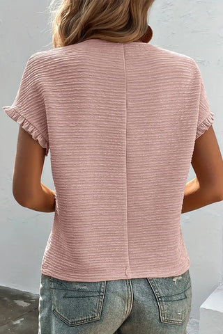 elegant light pink ruffled blouse