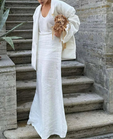 Conjunto de dos piezas para oficina, blazer, falda y bolsillos blancos 