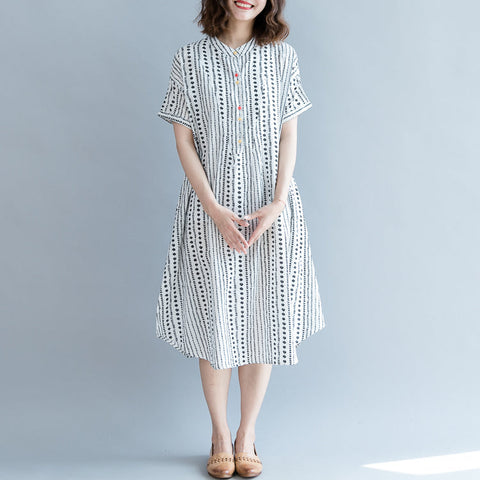 Vestido holgado informal de gasa con estampado floral blanco, holgado y de gran tamaño, con bolsillos y manga corta. 
