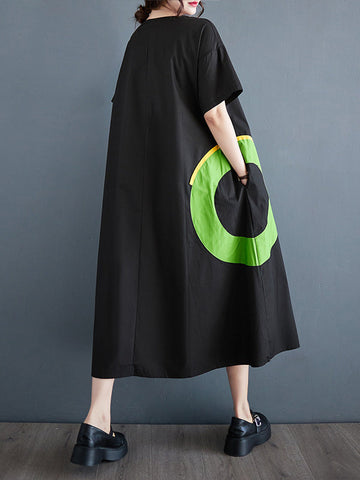 Vestidos midi holgados de manga corta con bolsillos de color en contraste y cuello redondo estampados 
