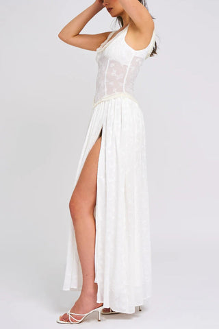 Vestido largo Ulissa verde claro con escote cuadrado, textura jacquard y abertura alta 