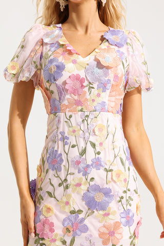 Vestido midi con cuello en V y mangas abullonadas bordadas 