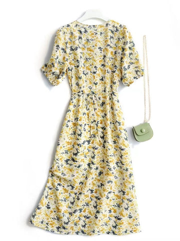 Vestido retro floral con mangas abullonadas 