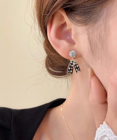 Pendientes Vogue con lazo de perla y aleación de cobre negro